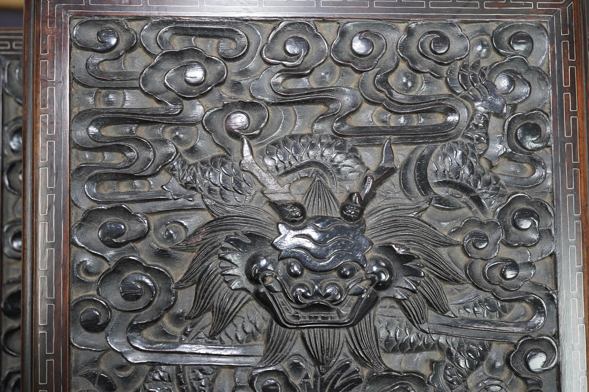 An important pair of Chinese carved zitan and silver wire inlaid ‘cloud and dragon’ curio cabinets and stands, duobaoge, probably Imperial, late Qing dynasty